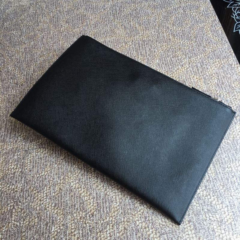 Pra*a clutch bags